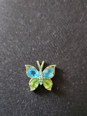 Gold Butterfly Pendant Necklace with diamonds, blue topaz and peridot stones